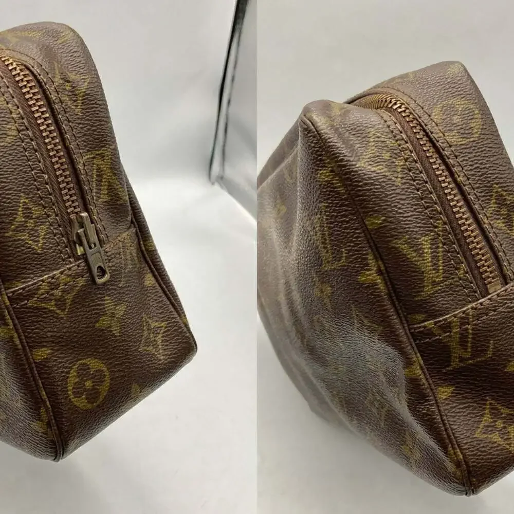 LOUIS VUITTON Brown Monogram Clutch Bag